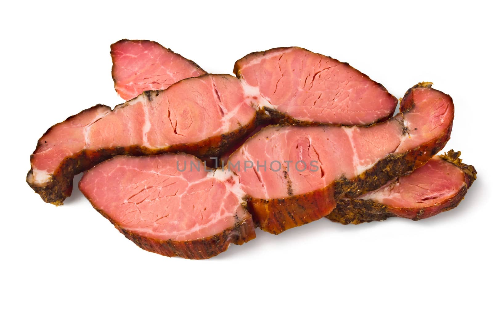 Three pieces of smoked meat on a white background