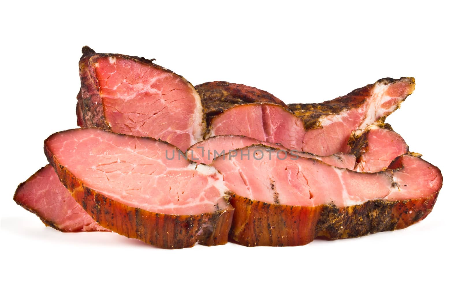 cold smoked meat pieces on white background