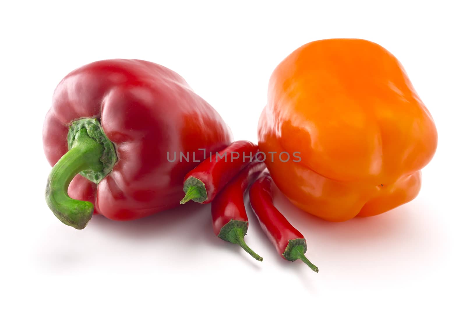 sweet and spicy peppers isolated on white background