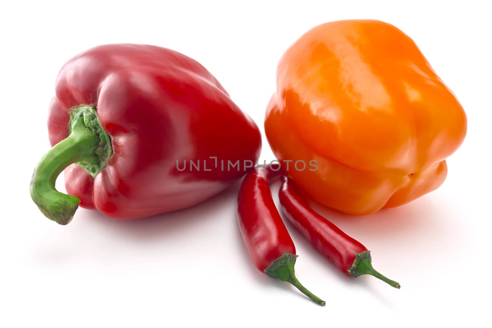 sweet and spicy peppers isolated on white background