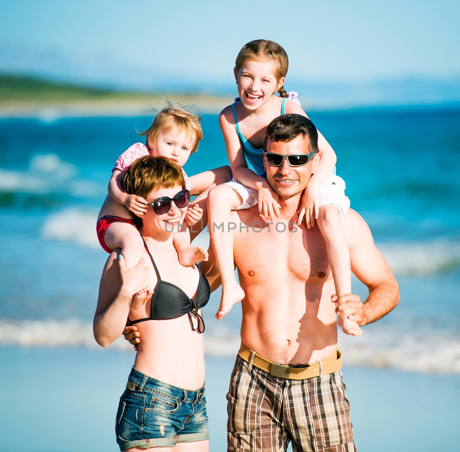 Family having fun at the beach