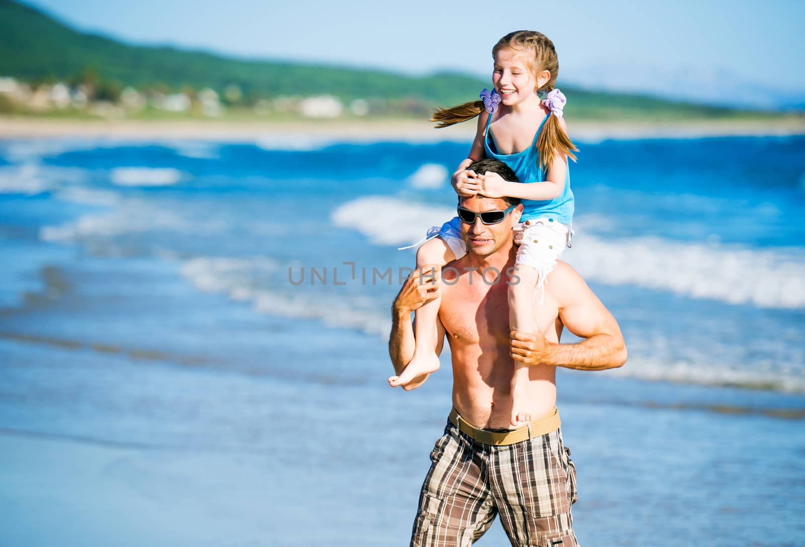 father and daughter on the beach by GekaSkr