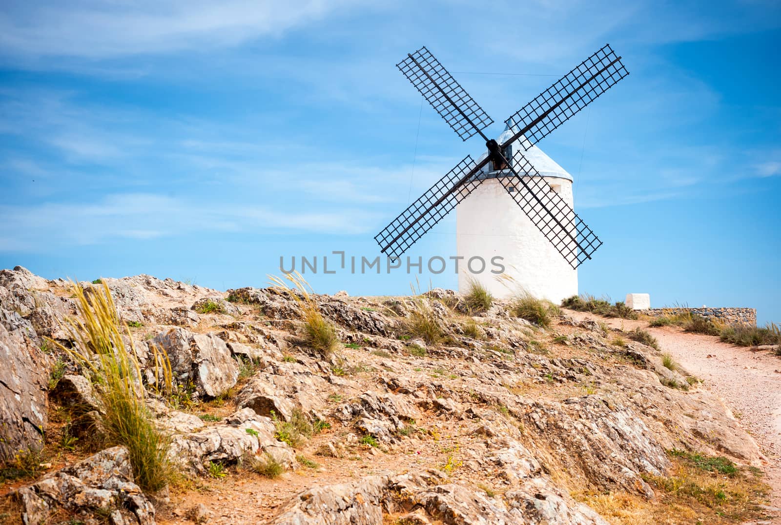 traditional windmills and castle in Consuegra, Toledo, Spain