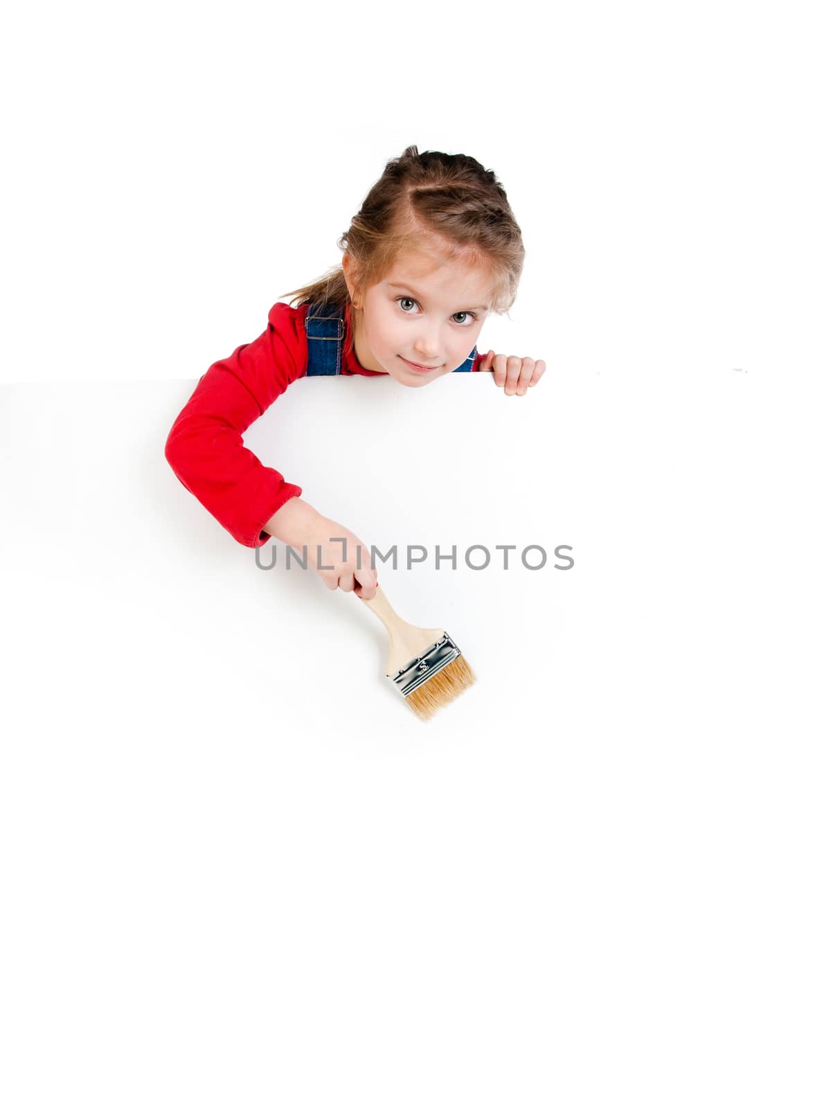 Pretty little girl with a brush and white banner