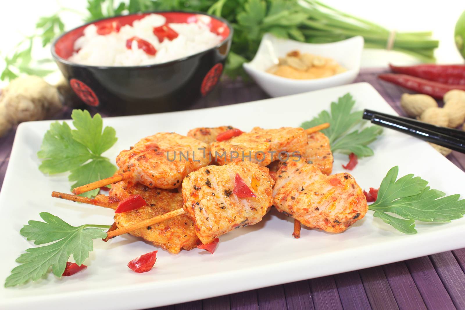 Asian satay skewers with chilli and peanut sauce by discovery