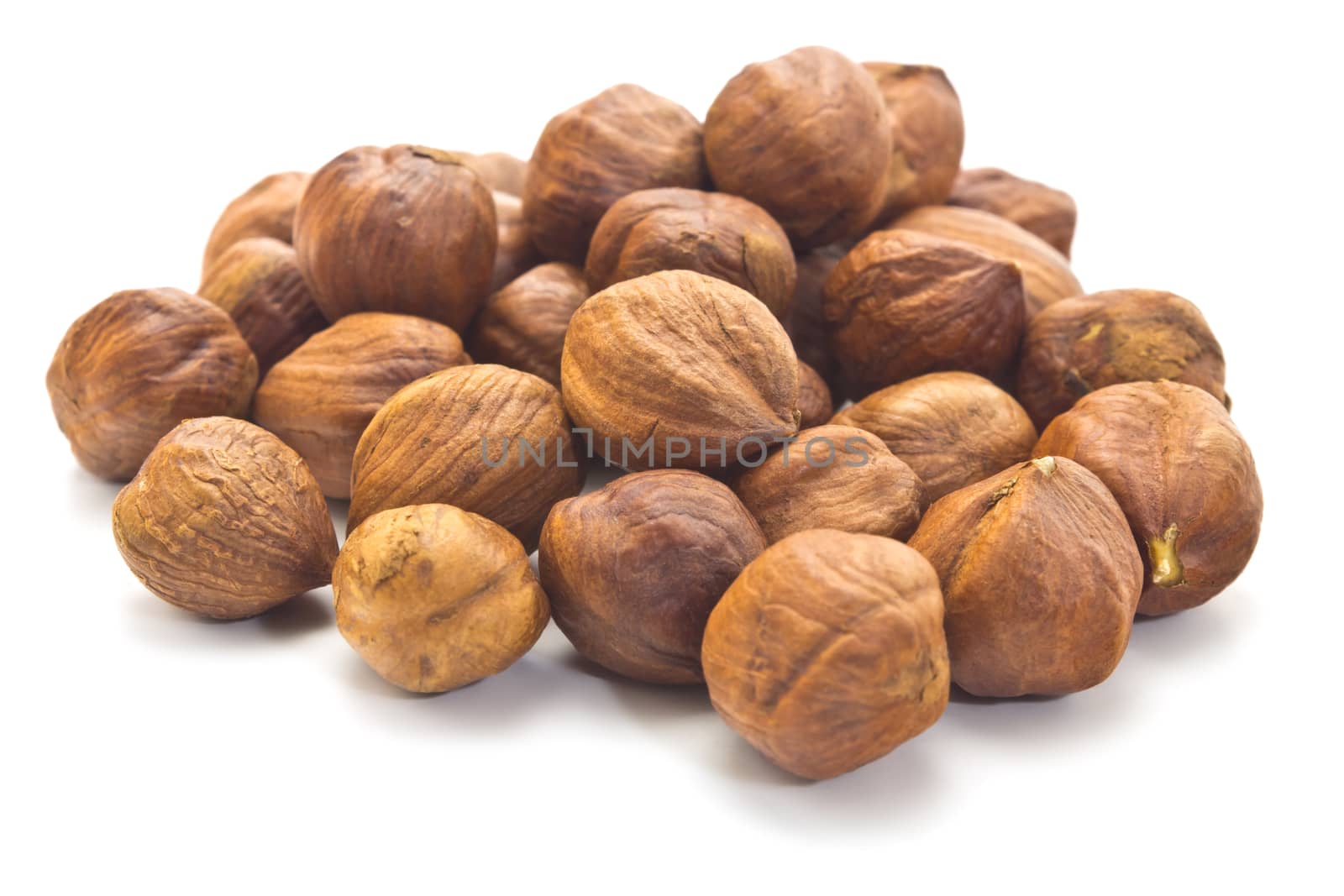 small group of kernels of a filbert isolated on a white background