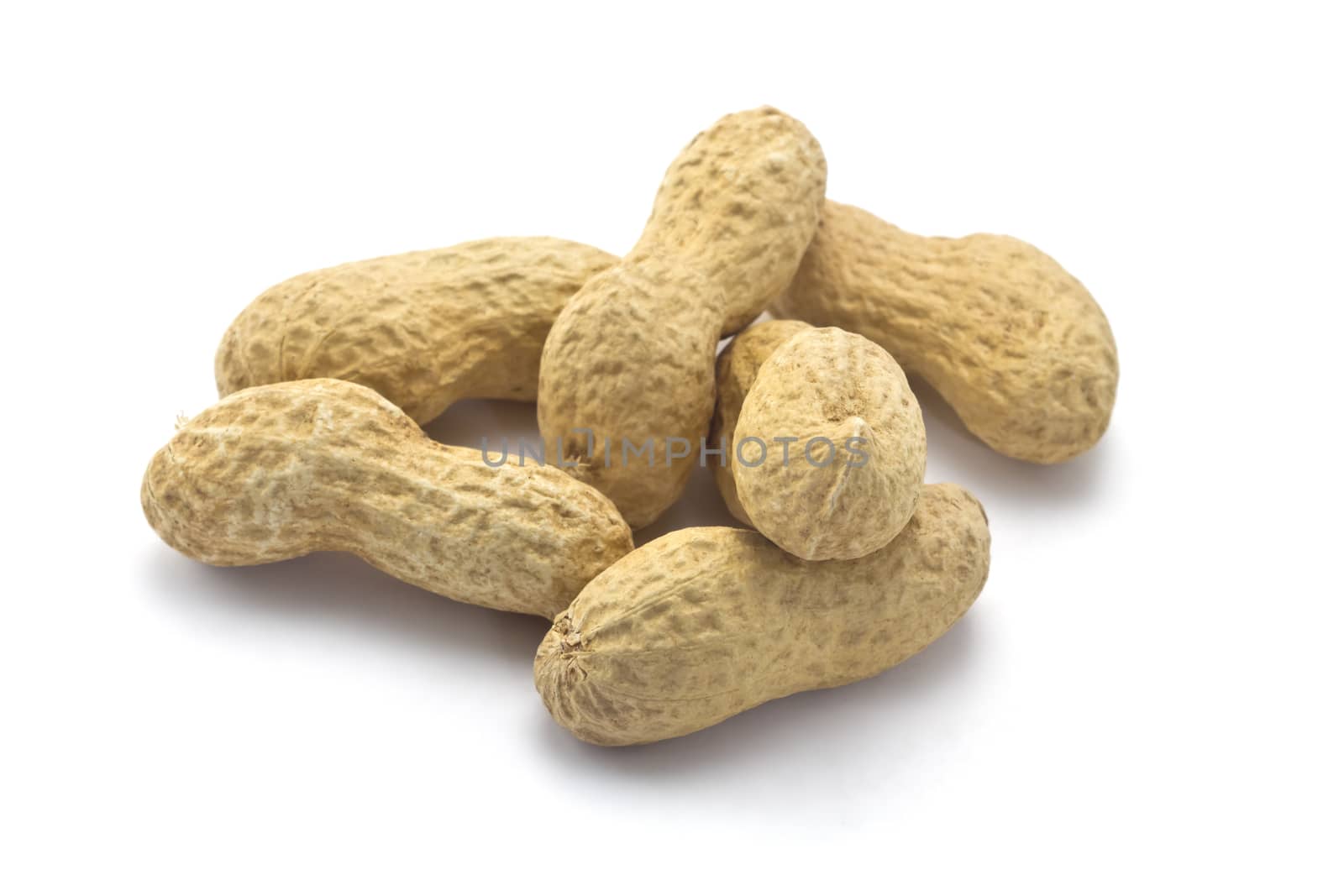 peanuts in the shell on a white background