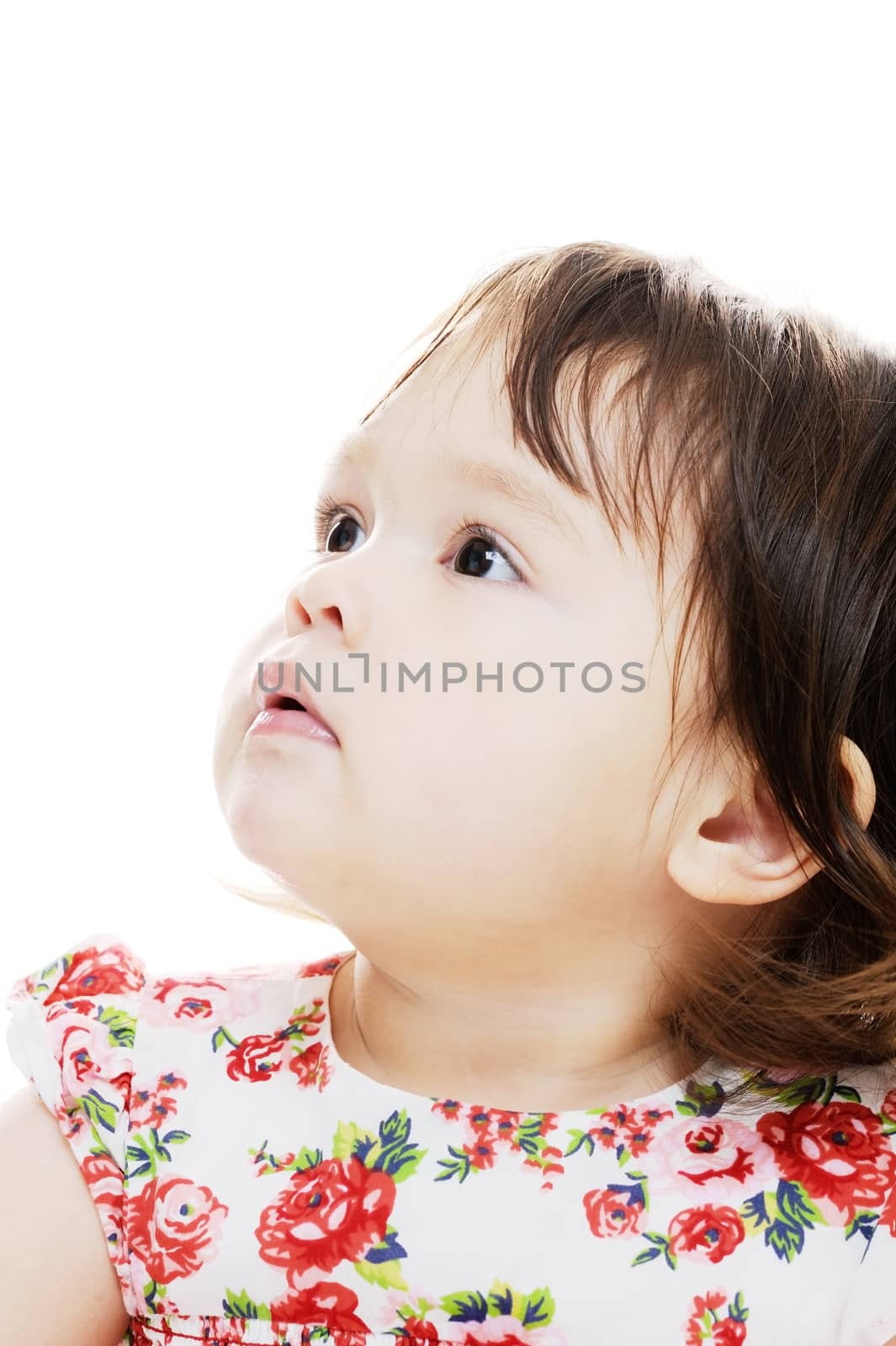 Young girl looking up closeup portrait