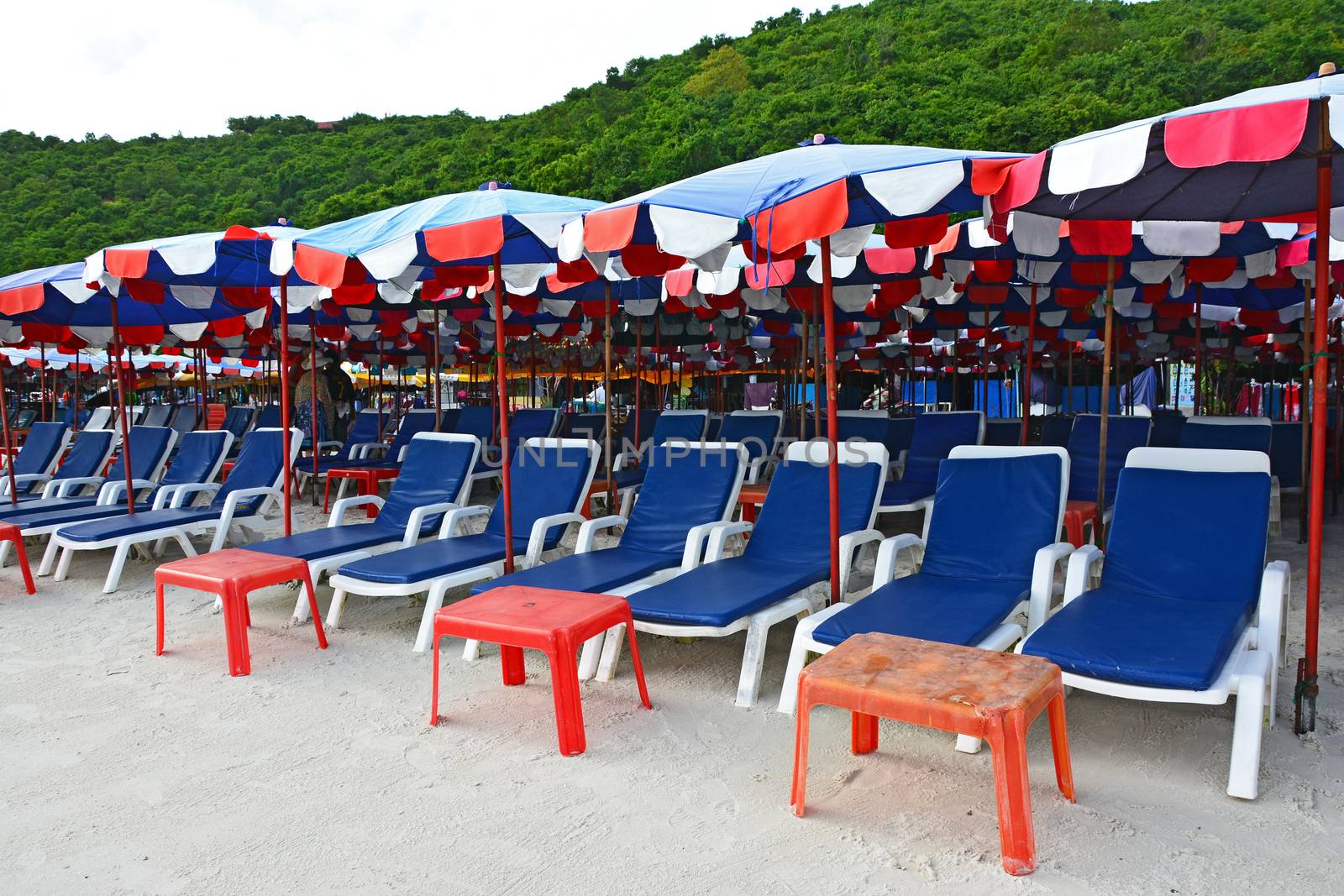 beach chairs and umbrella at Koh Larn, Pataya,Thailand