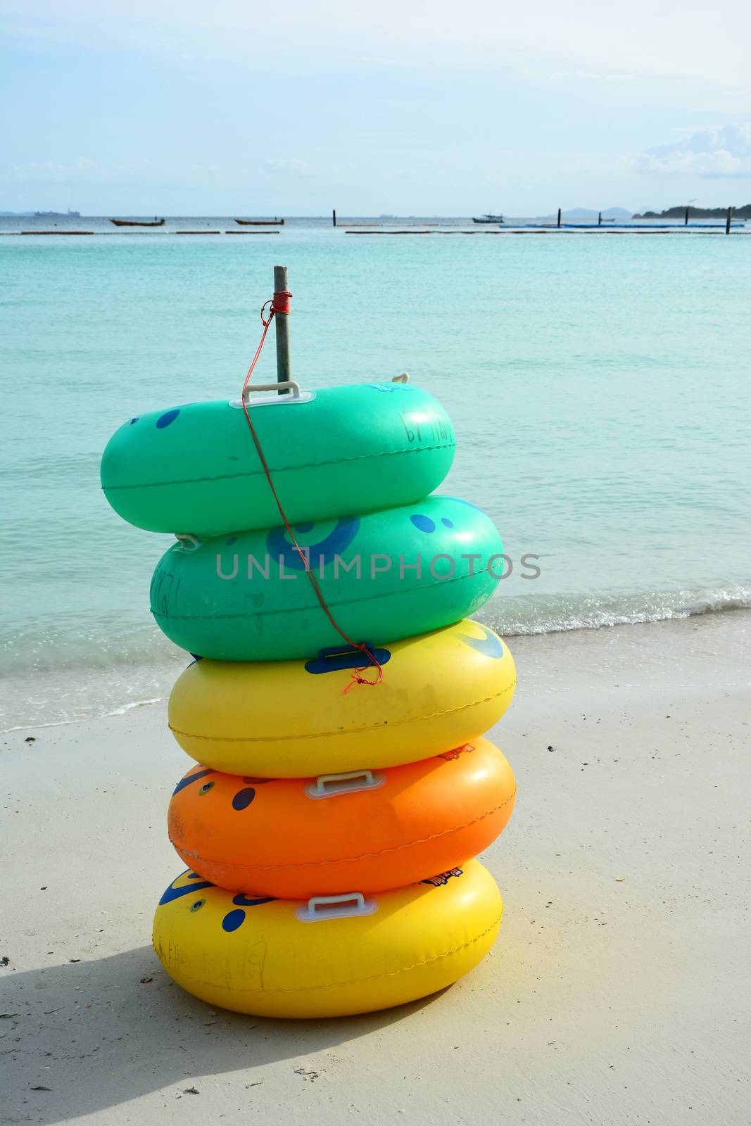 Colored ring on the beach at coral island or Koh Larn ,Pattaya Thailand
