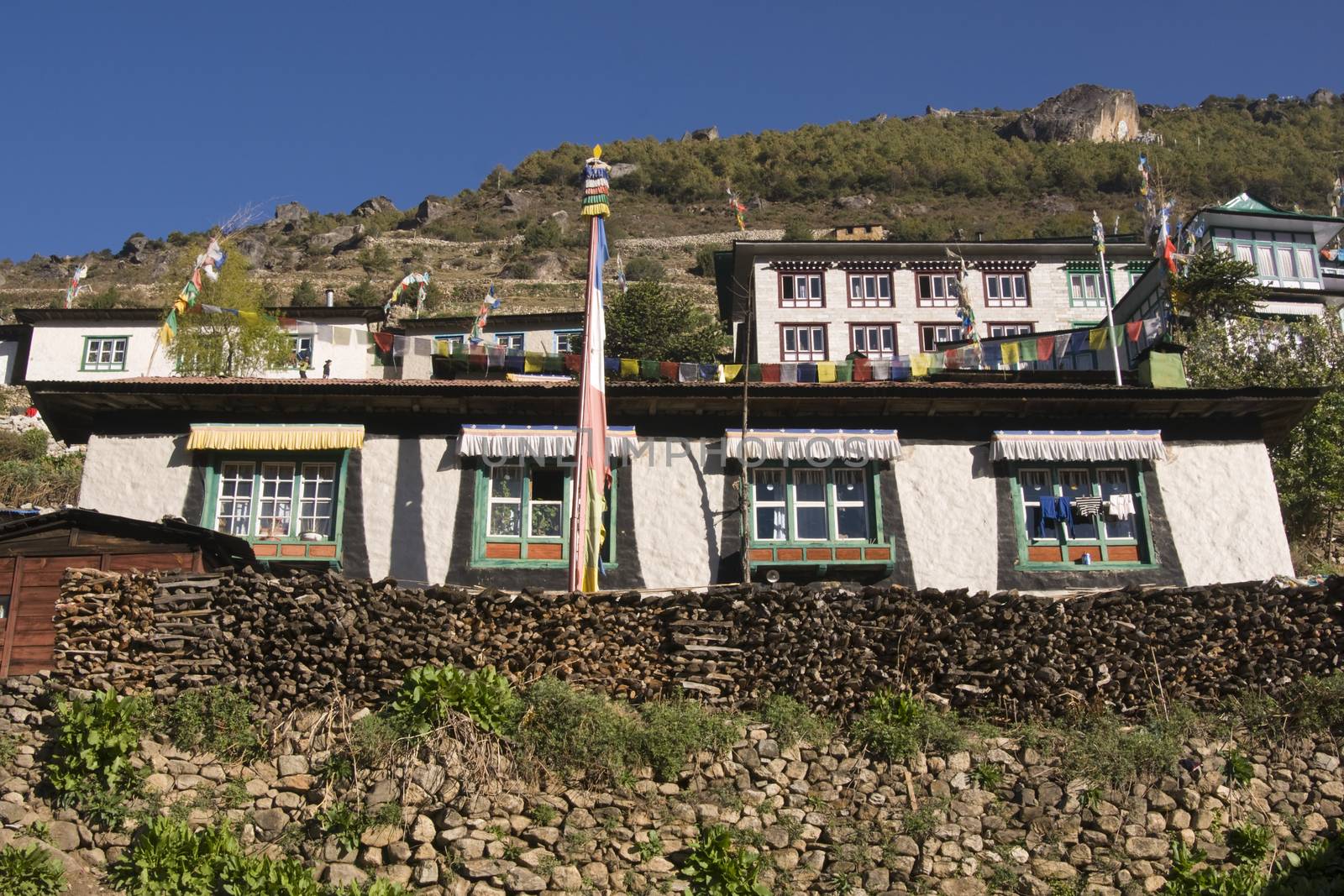 Tibetan style houses in the village of Namche Bazar at an altitude of 3440M in the Nepalese Himalayas. A major staging post for trekking to Everest Base Camp.