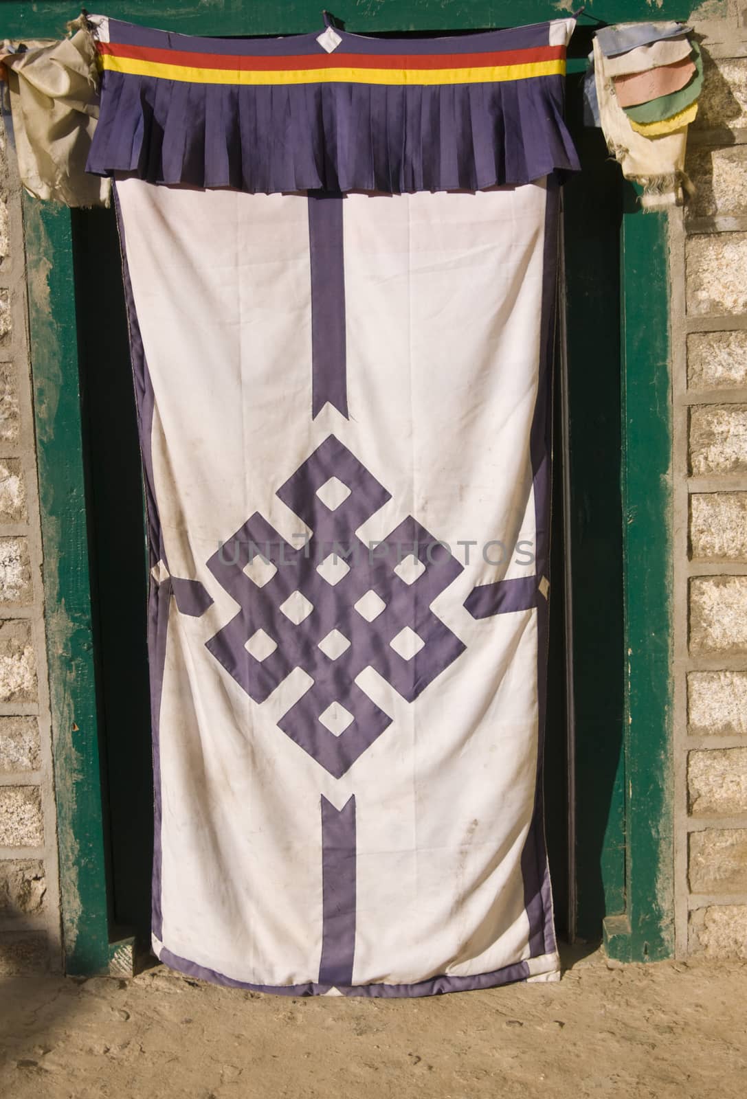 Traditional Tibetan style entrance to a house in the village of Namche Bazar in the Nepalese Himalayas.