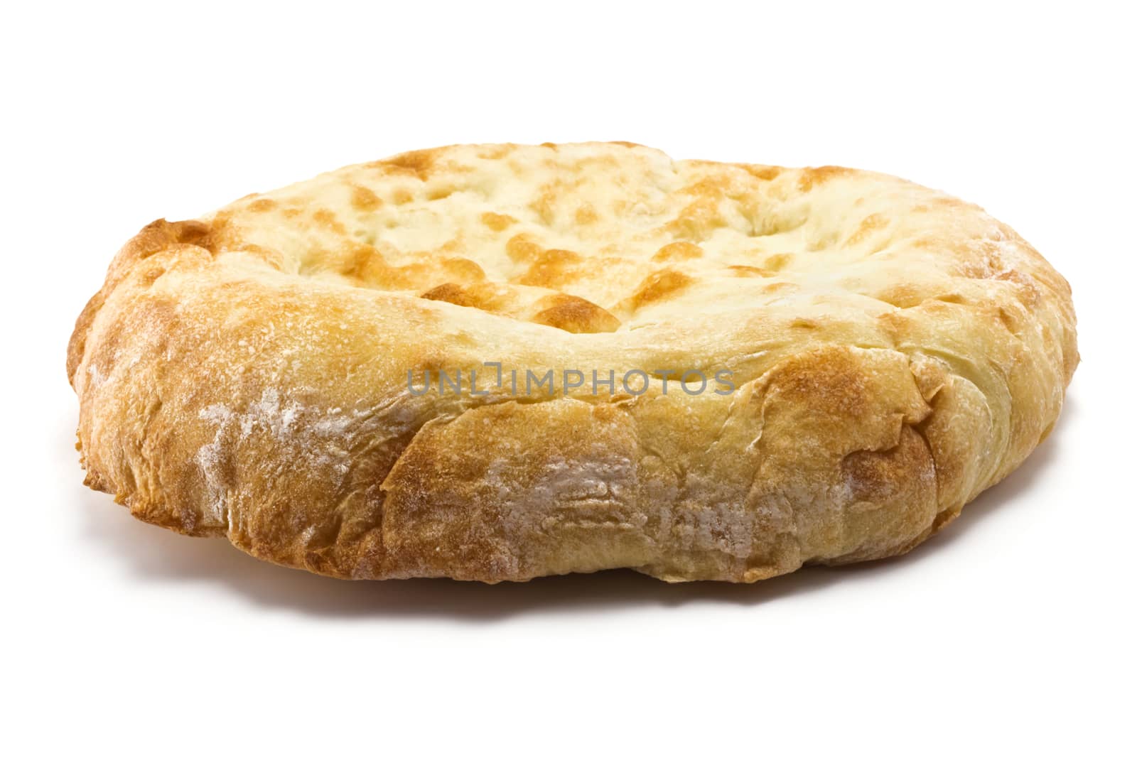 crispy pitta bread on a white background