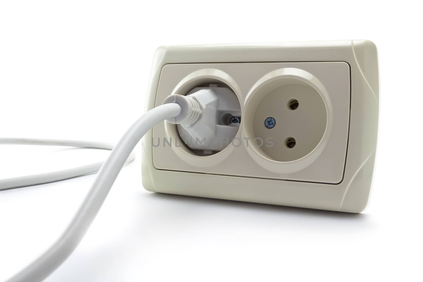 double socket and the cord with a plug on a white background