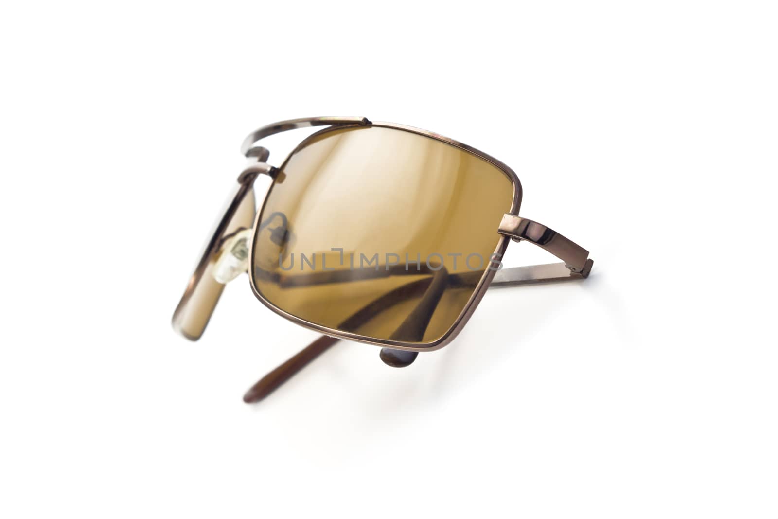 brown sunglasses to protect from the sun, isolated on white background