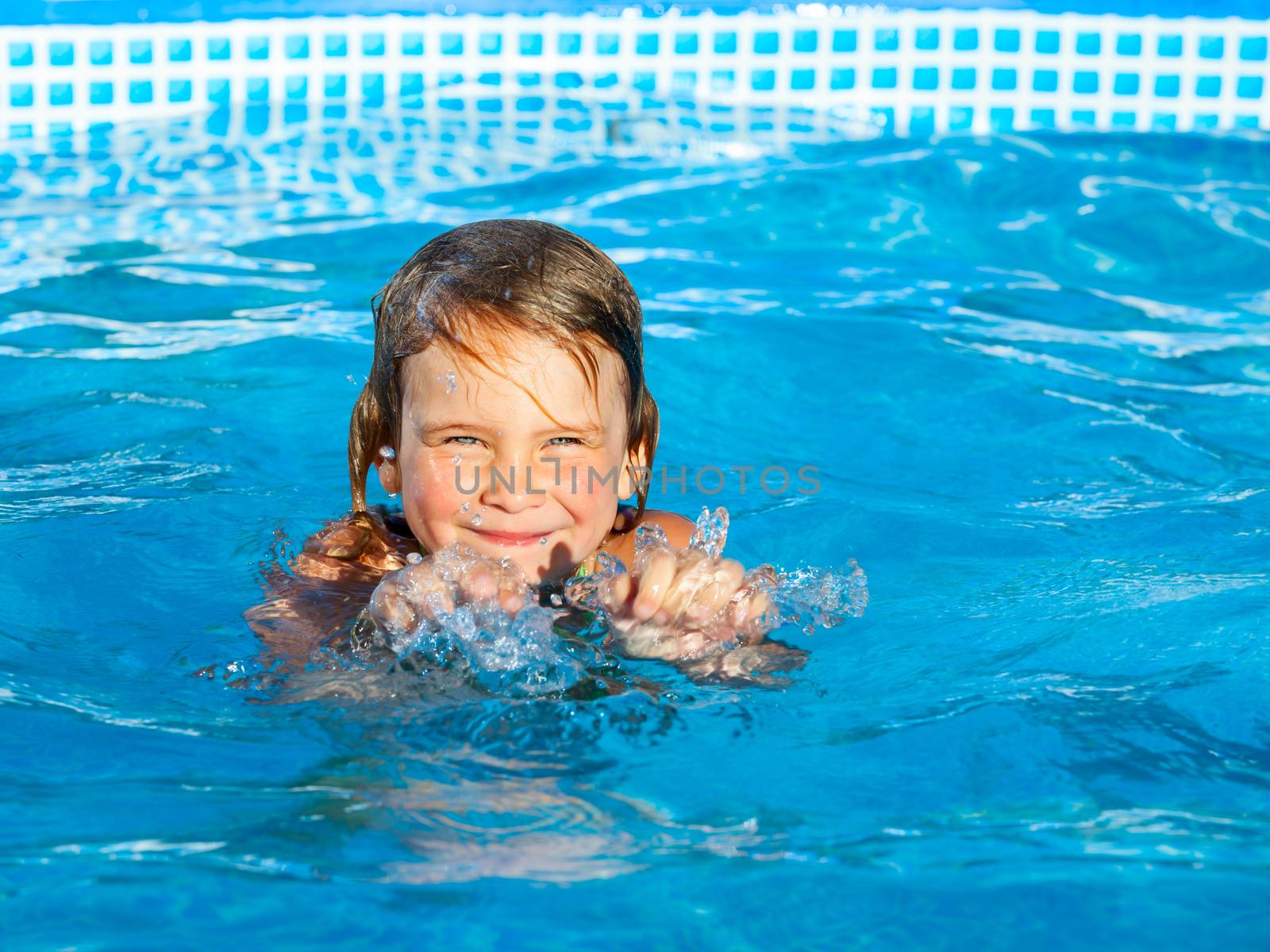 Girl swiming in a pool by naumoid
