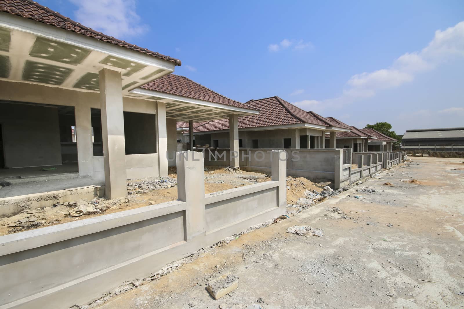 New house under construction with blue sky