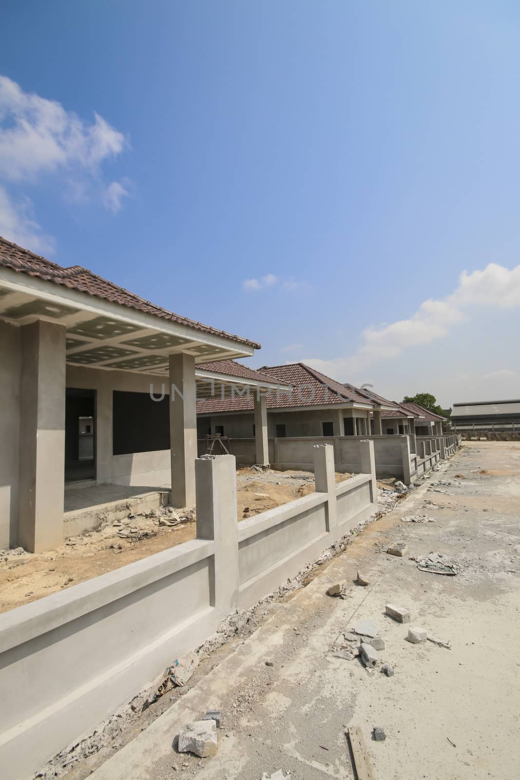 New house under construction with blue sky