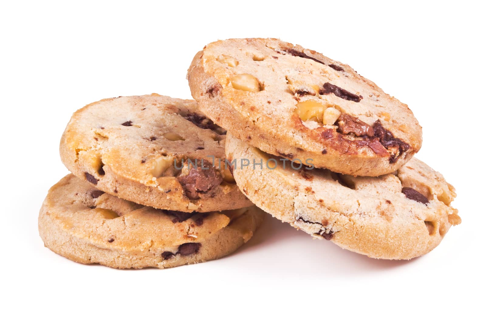 four round shortbread cookies with peanuts and chocolate on white background