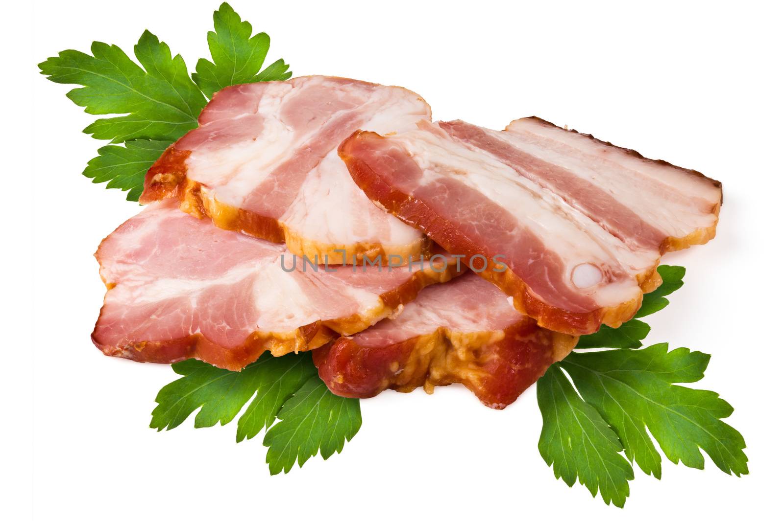 Smoked pork brisket and green leaves of parsley on a white background