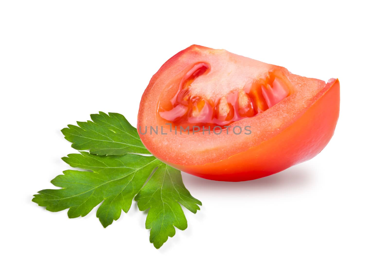 slice of tomato and parsley leaf on white background