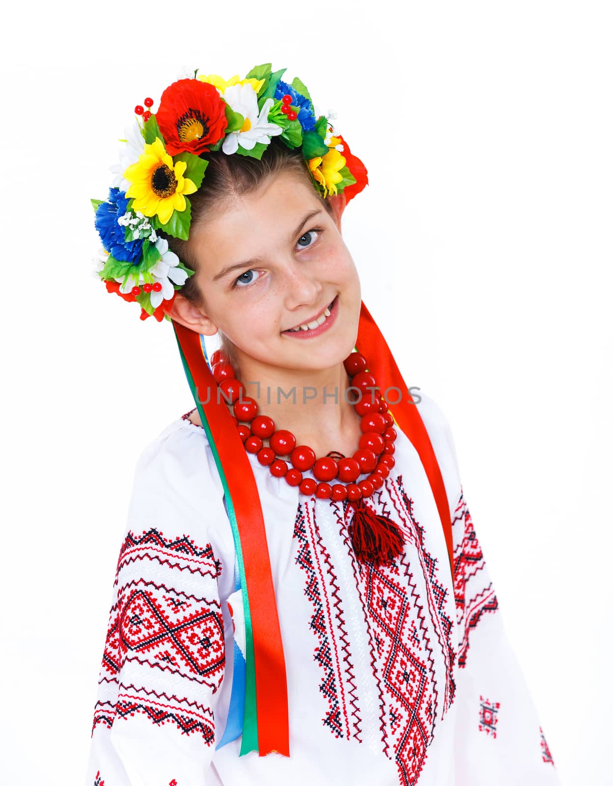 Portrait of happy cute girl in the Ukrainian national costume. Isolated white background