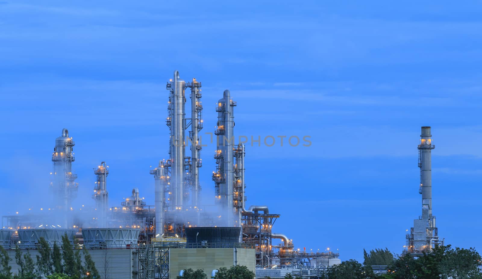 Lighting on structure of oil and chemical refinery plant on twilight time