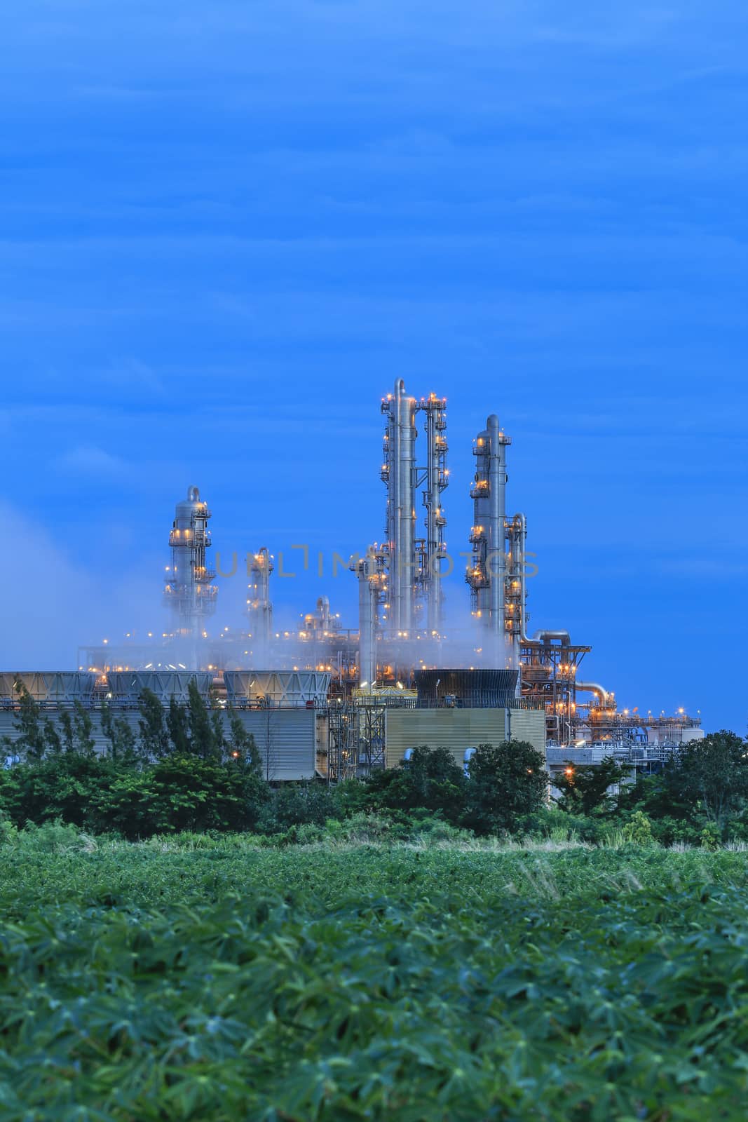 Lighting on structure of oil and chemical refinery plant on twilight time