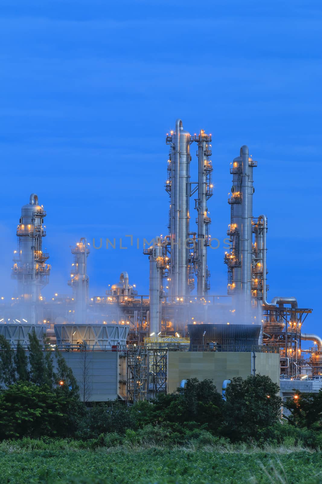 Lighting on structure of oil and chemical refinery plant on twilight time