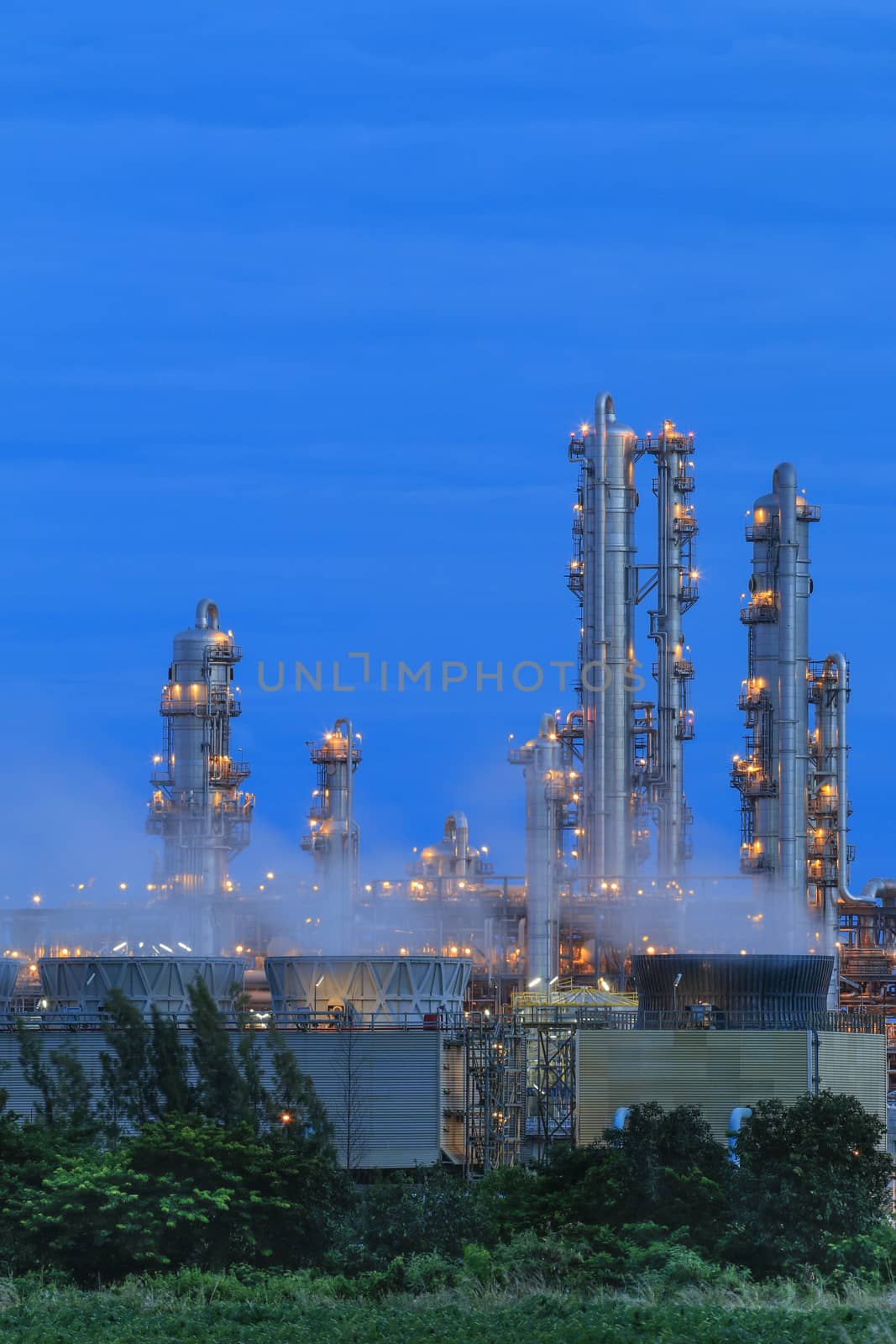 Lighting on structure of oil and chemical refinery plant on twilight time