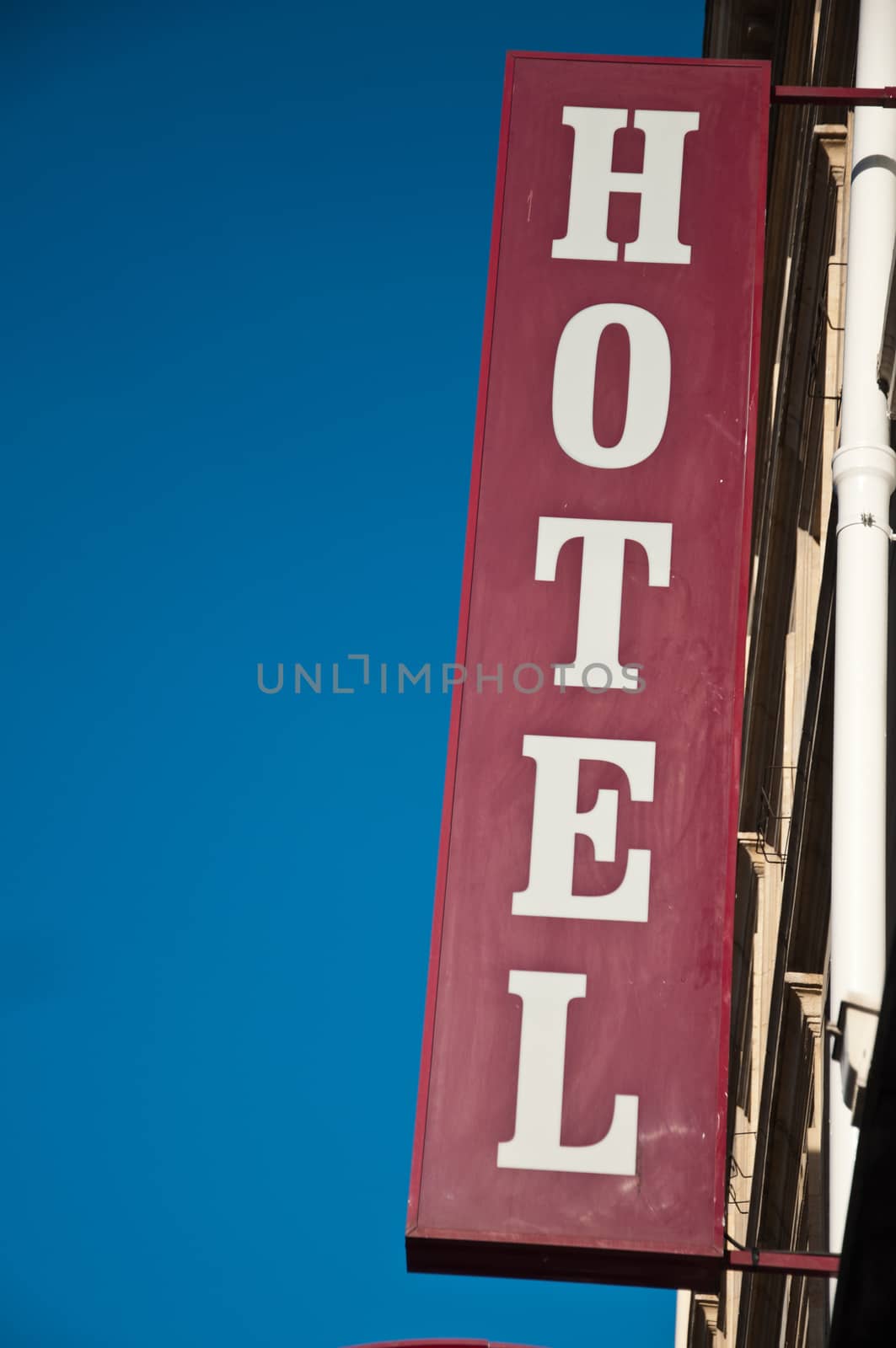 Hotel facade by NeydtStock