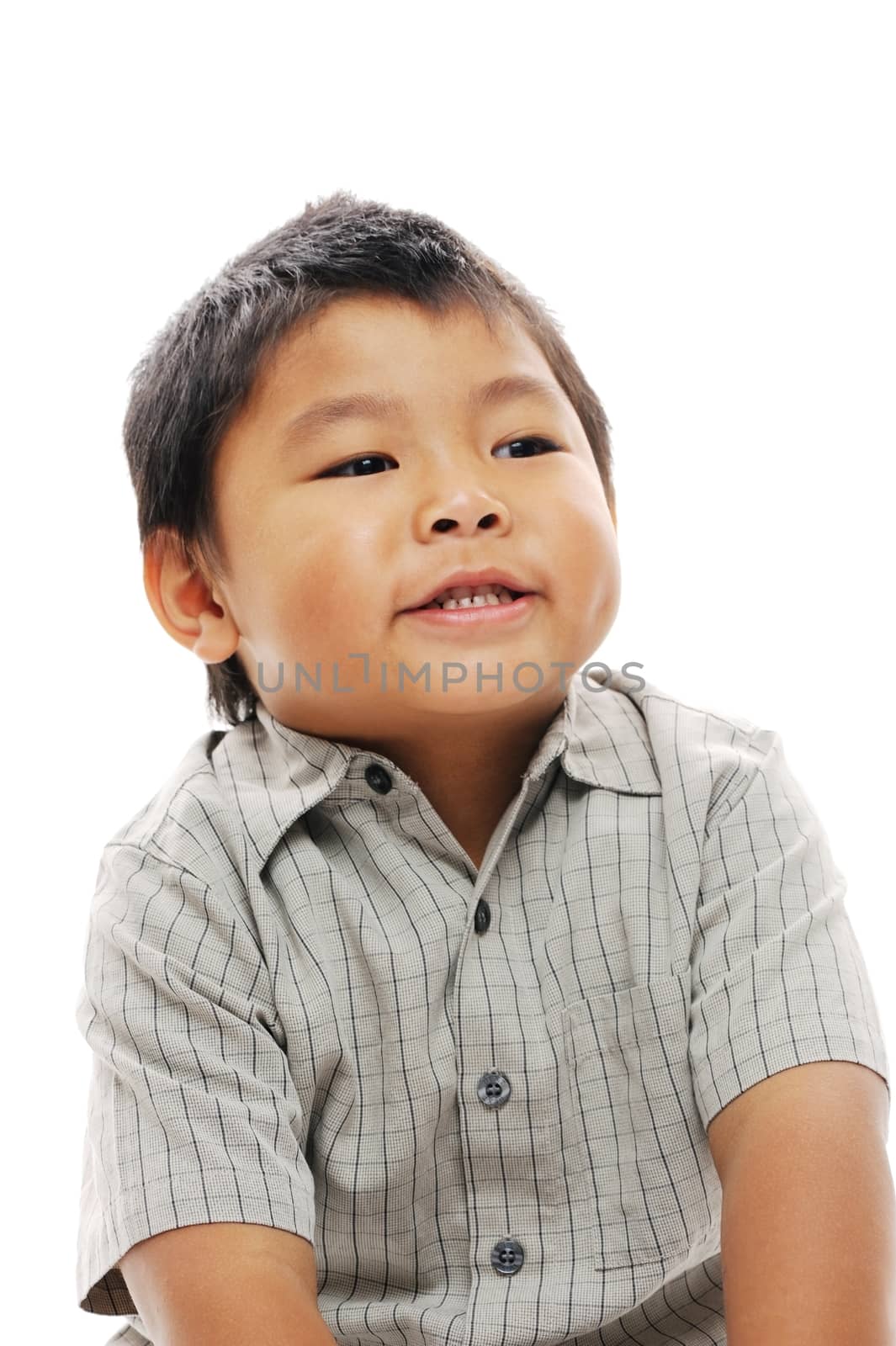 Asian boy laughing and looking happy