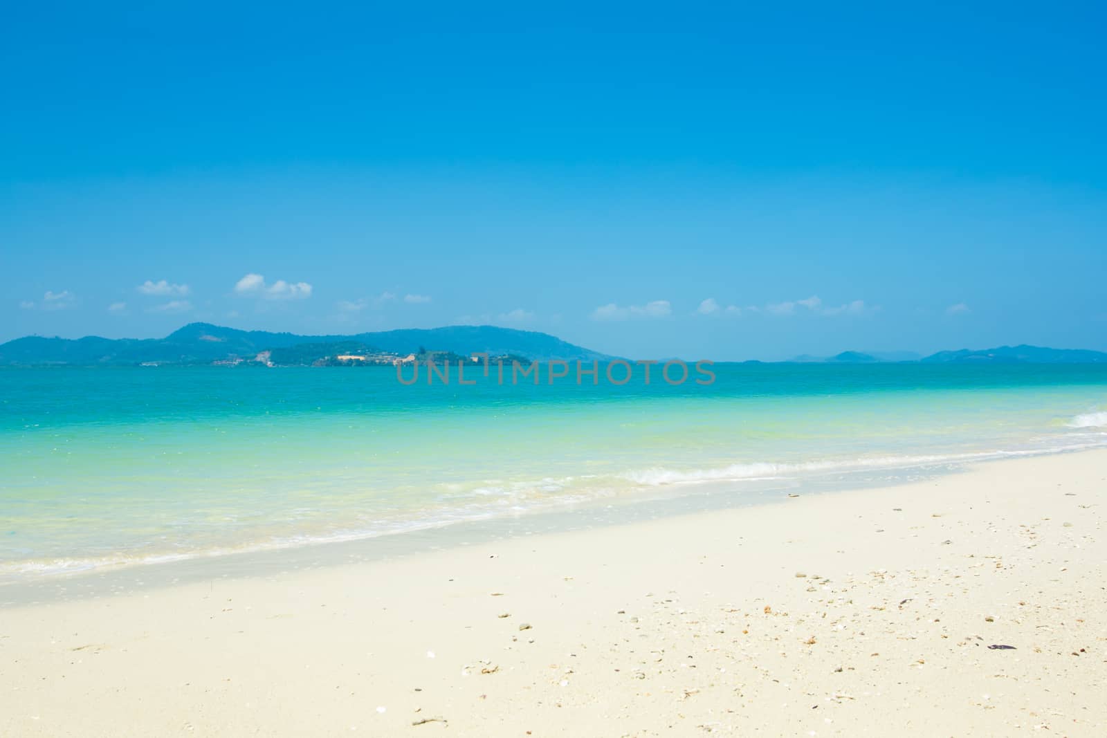 Tropical beach with blue sky background 