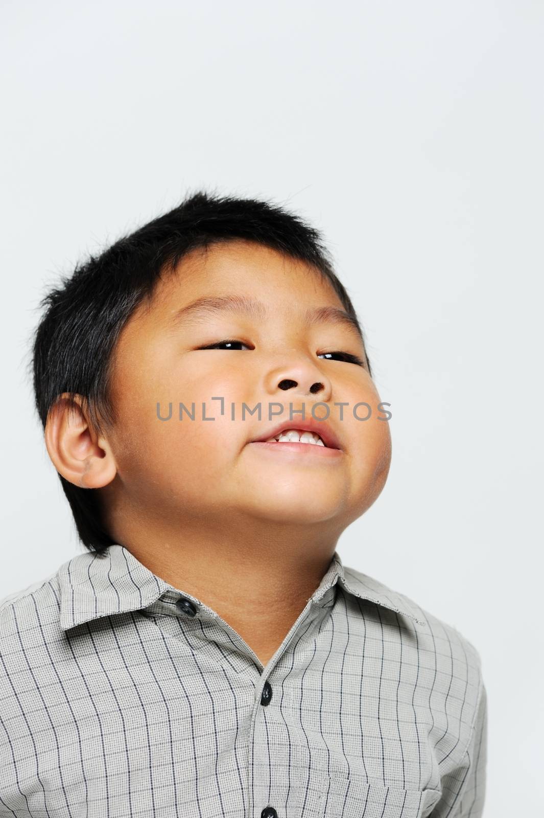 Asian boy looking happy and cute