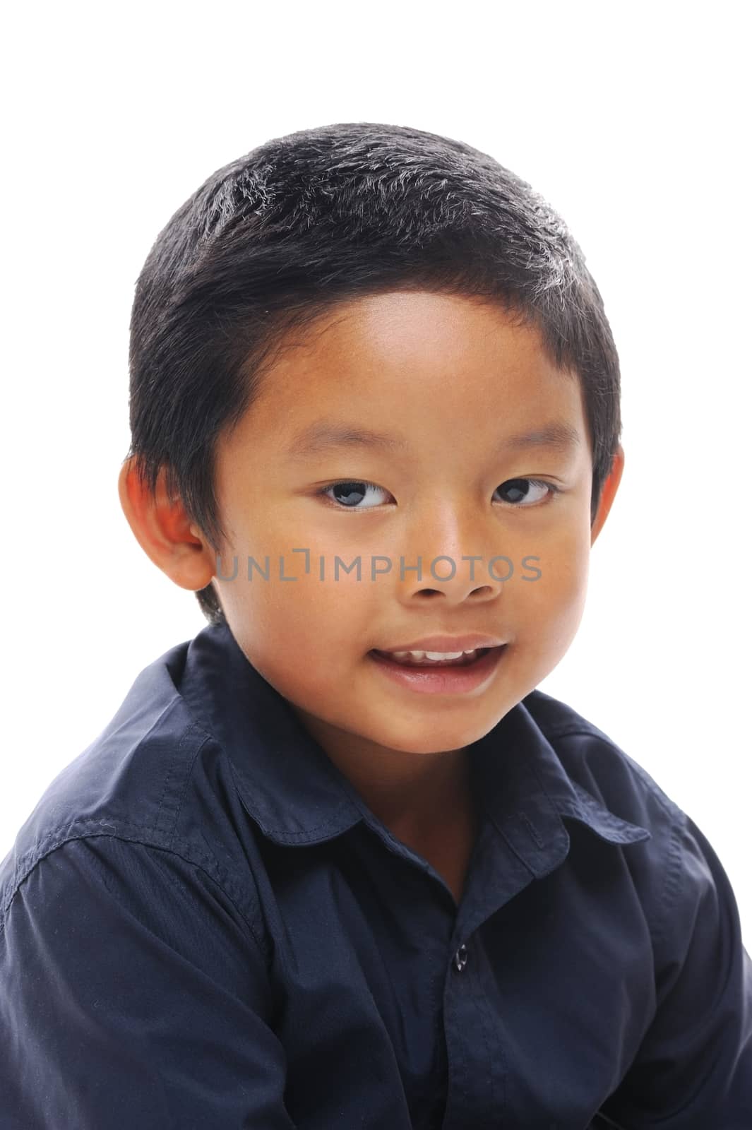 Asian boy looking happy wearing blue shirt