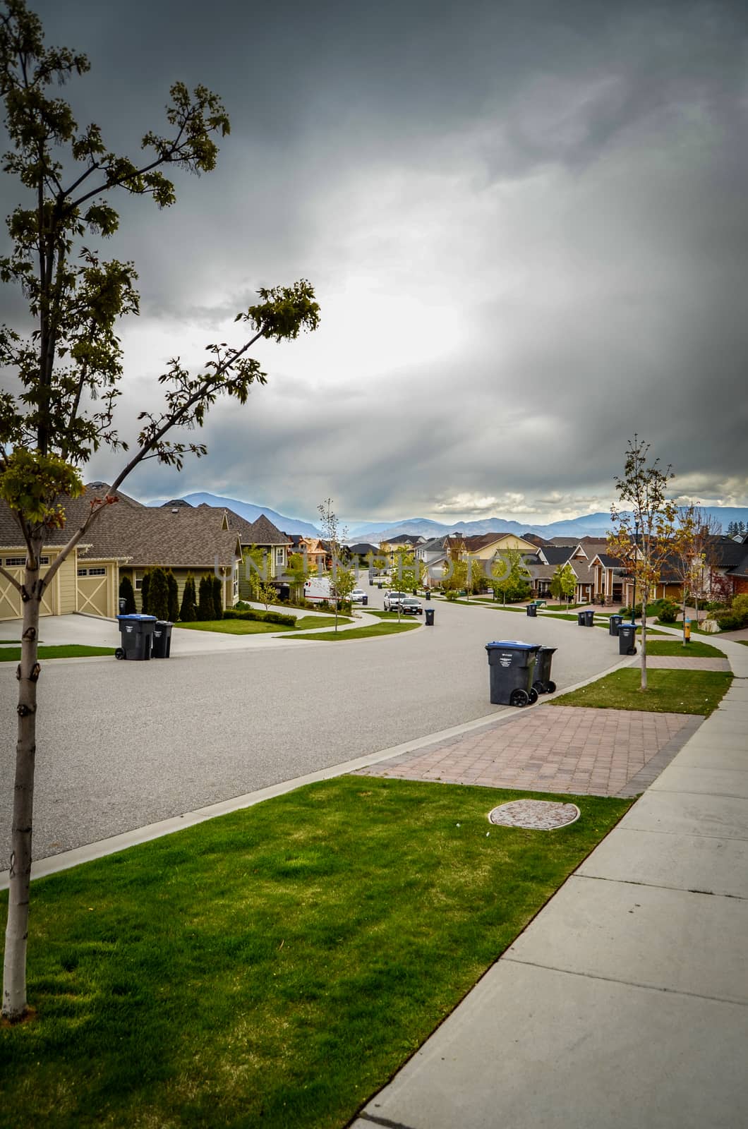 Stormy Skies Over An Emptied Average Suburban Street