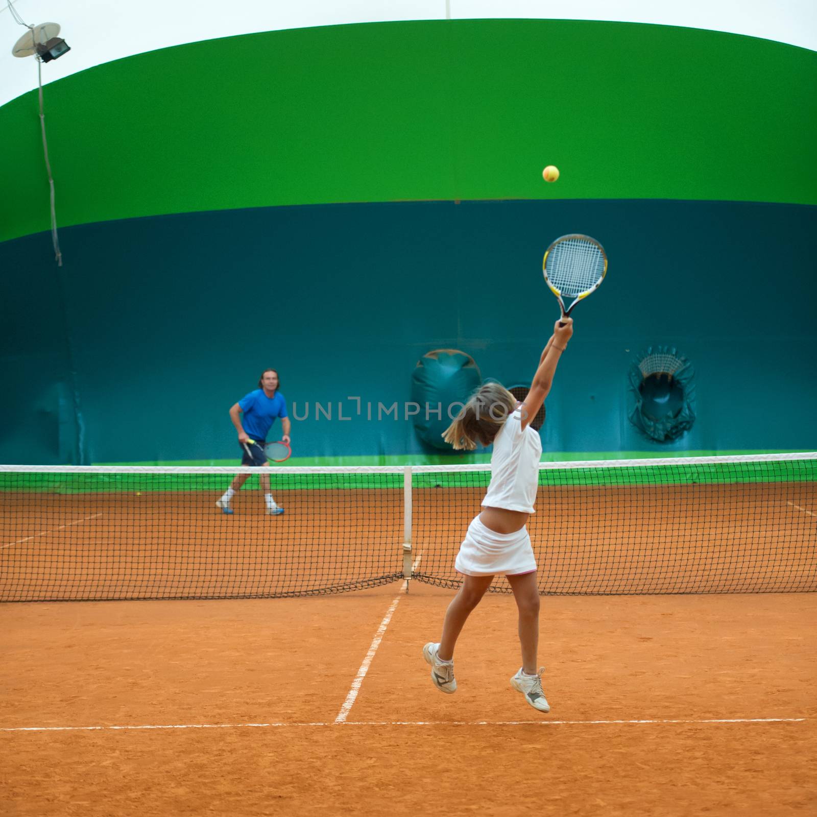 Children at school during a dribble of tennis