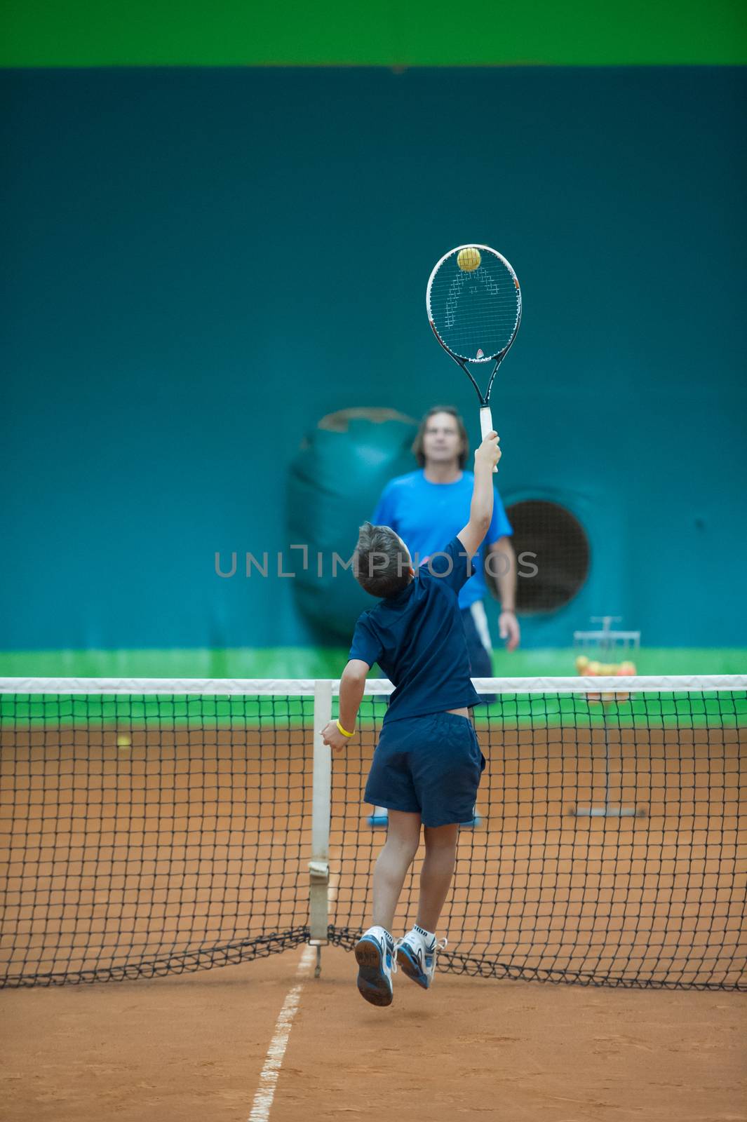 Children at school during a dribble of tennis