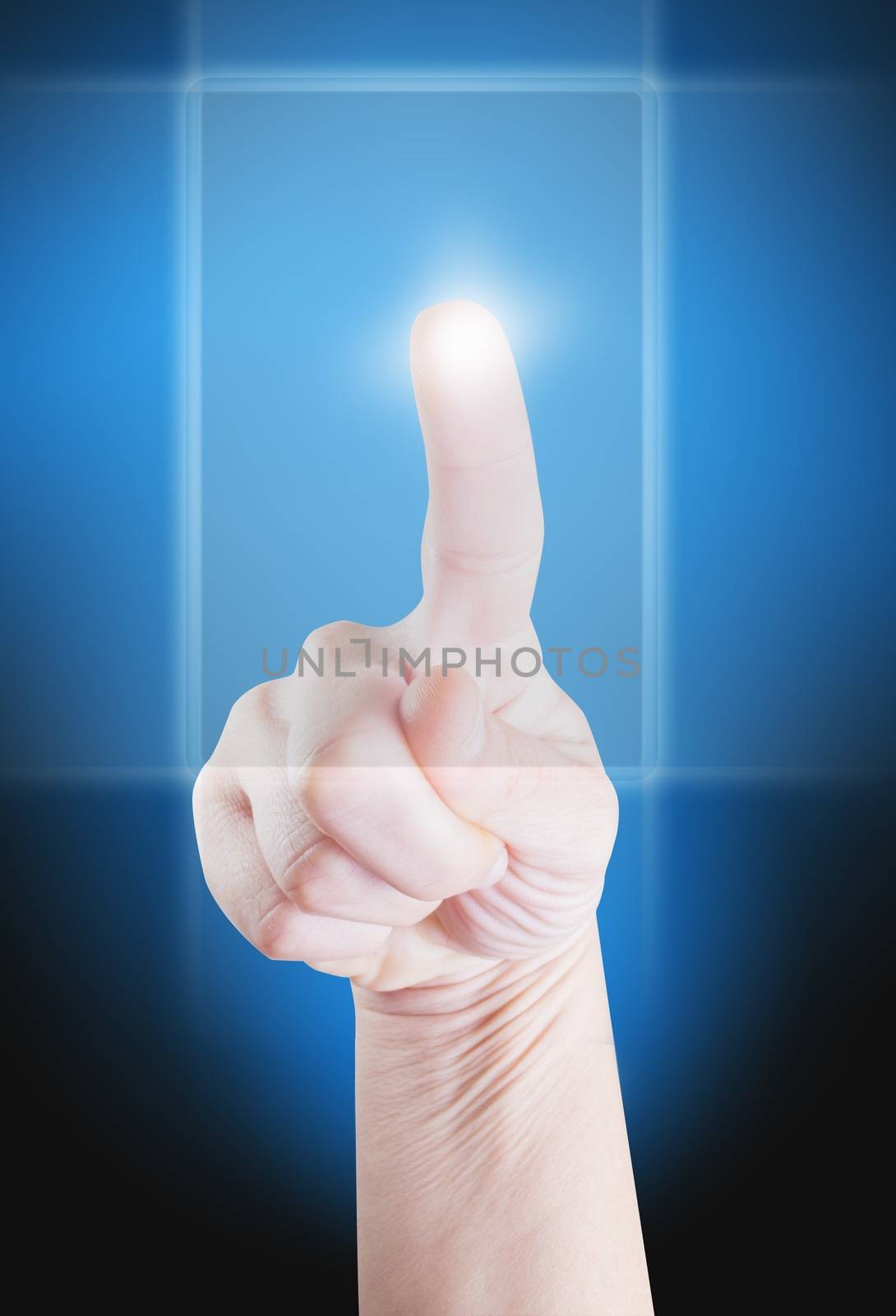 Picture of a finger pointing on a transparent device