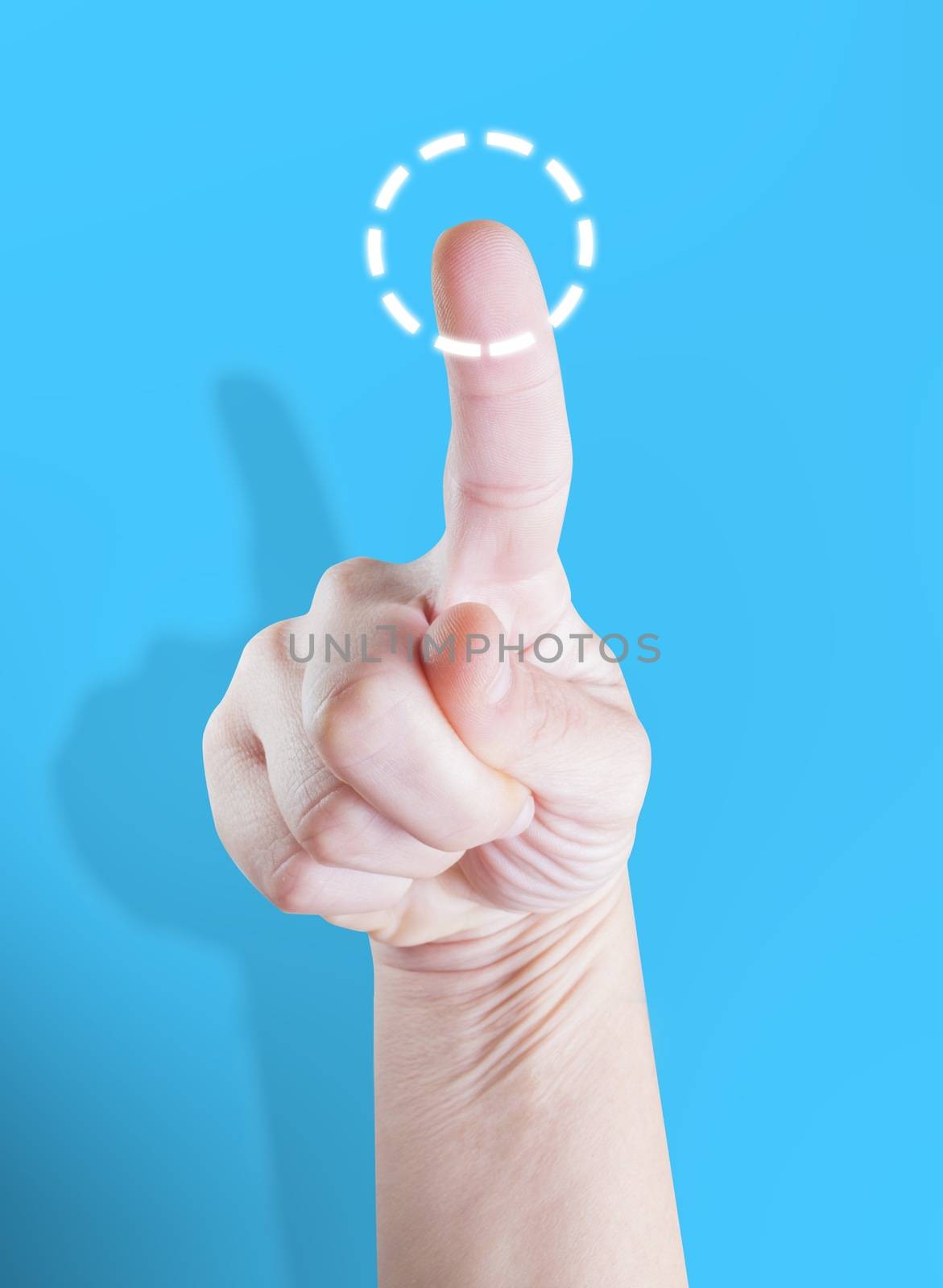 Picture of a finger pointing on a transparent device