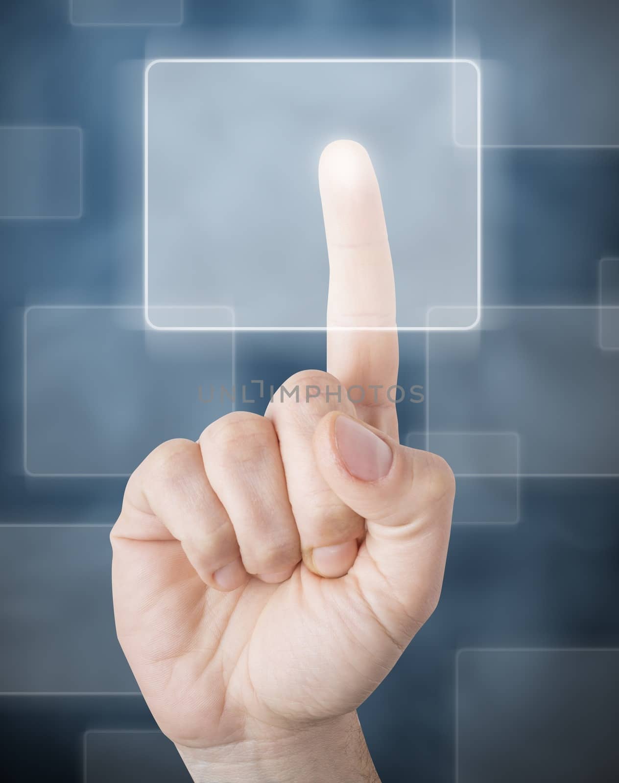 Picture of a finger pointing on a transparent device.

