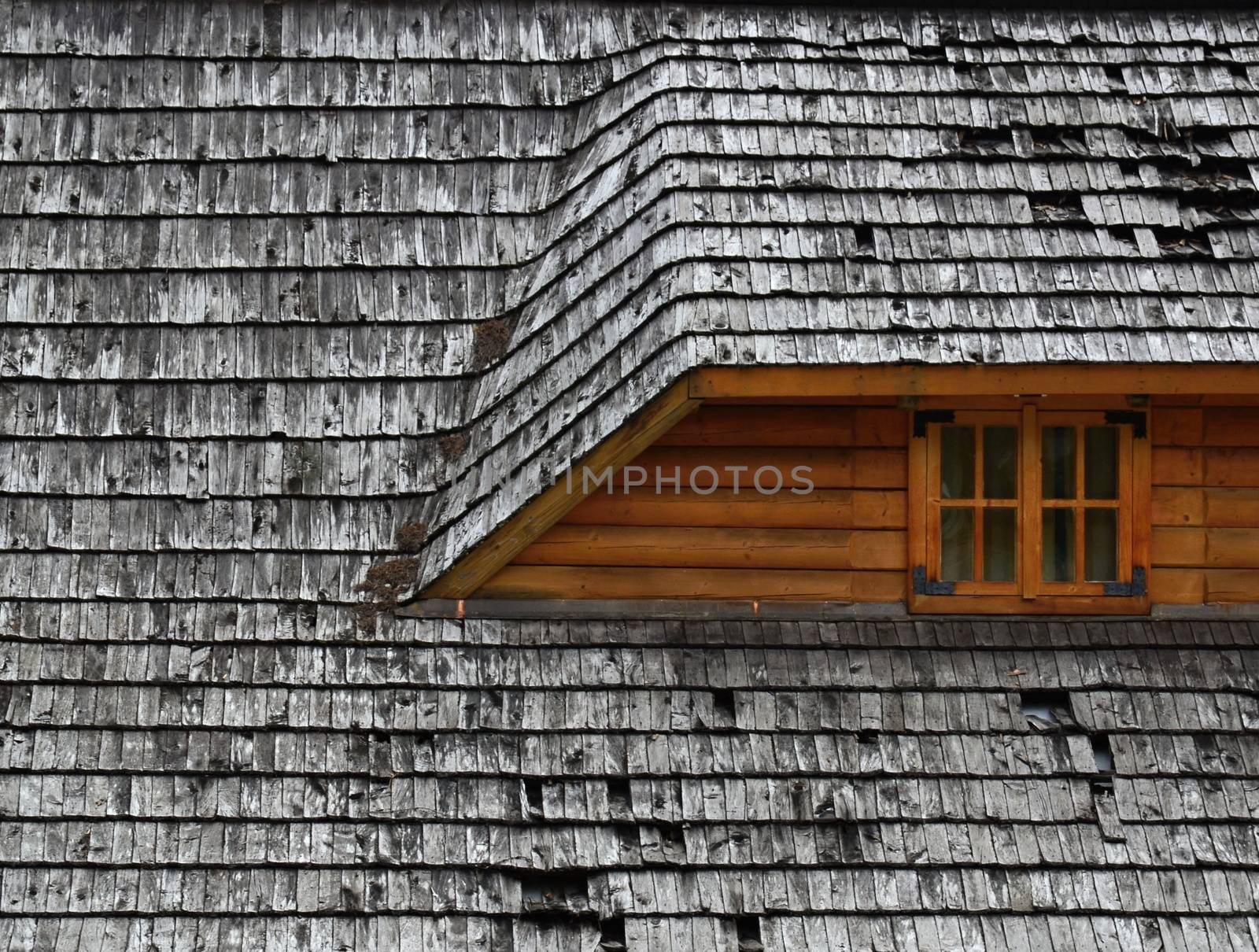 Old roof on a wooden cottage by Ahojdoma