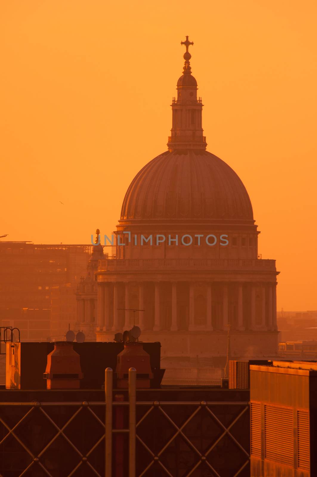 London's famous tourist landmark and place of worship St Pauls Cathedral at sunset 