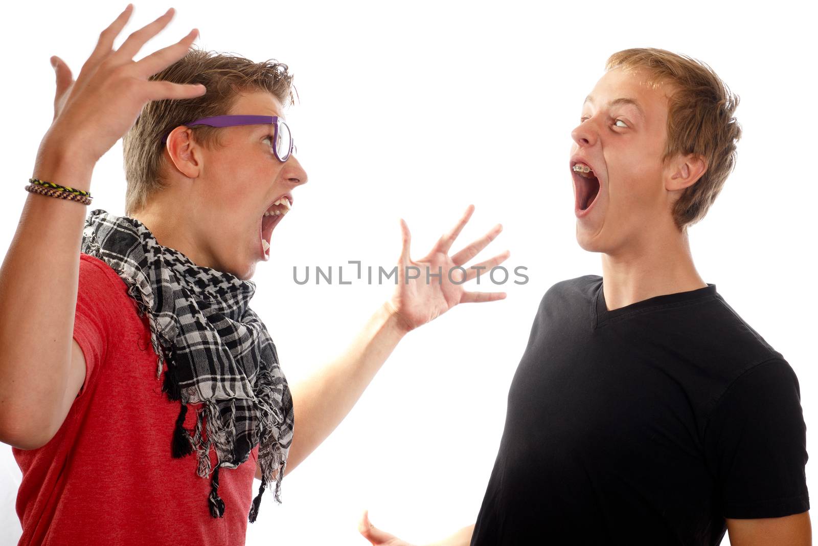 Two teen boys having a conflict, screaming at each other