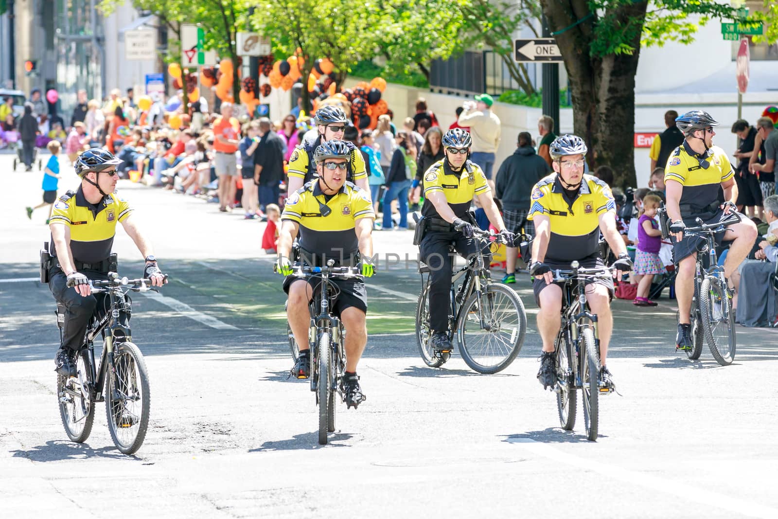 Portland, Oregon, USA - JUNE 7, 2014: Portland Police Bureau in Grand floral parade through Portland downtown.