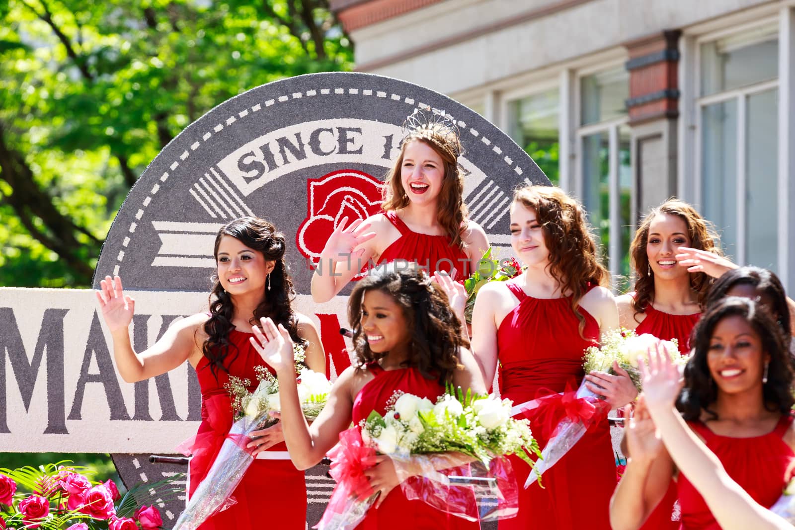 Portland, Oregon, USA - JUNE 7, 2014: 2014 Rose Festival Court in Grand floral parade through Portland downtown.