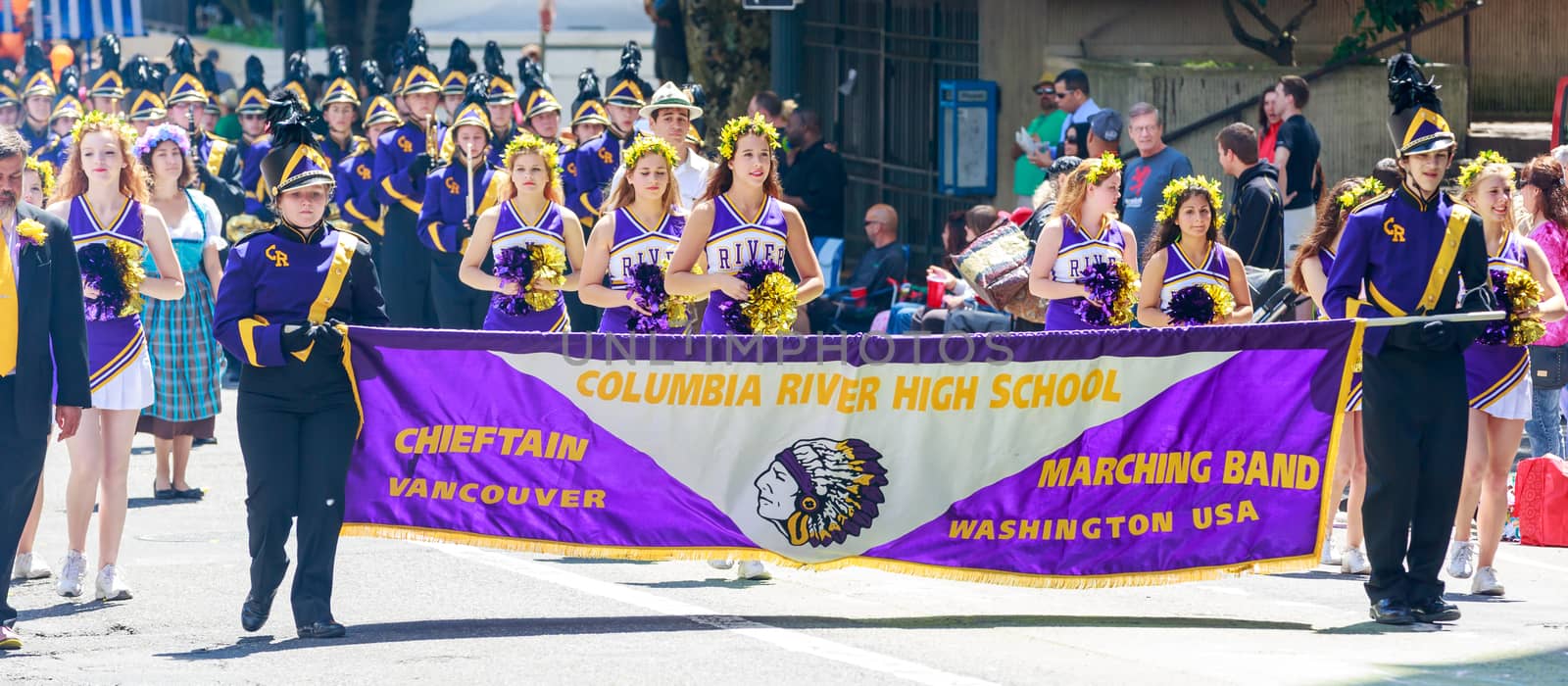 Portland, Oregon, USA - JUNE 7, 2014: Columbia River High School Marching Band in Grand floral parade through Portland downtown.