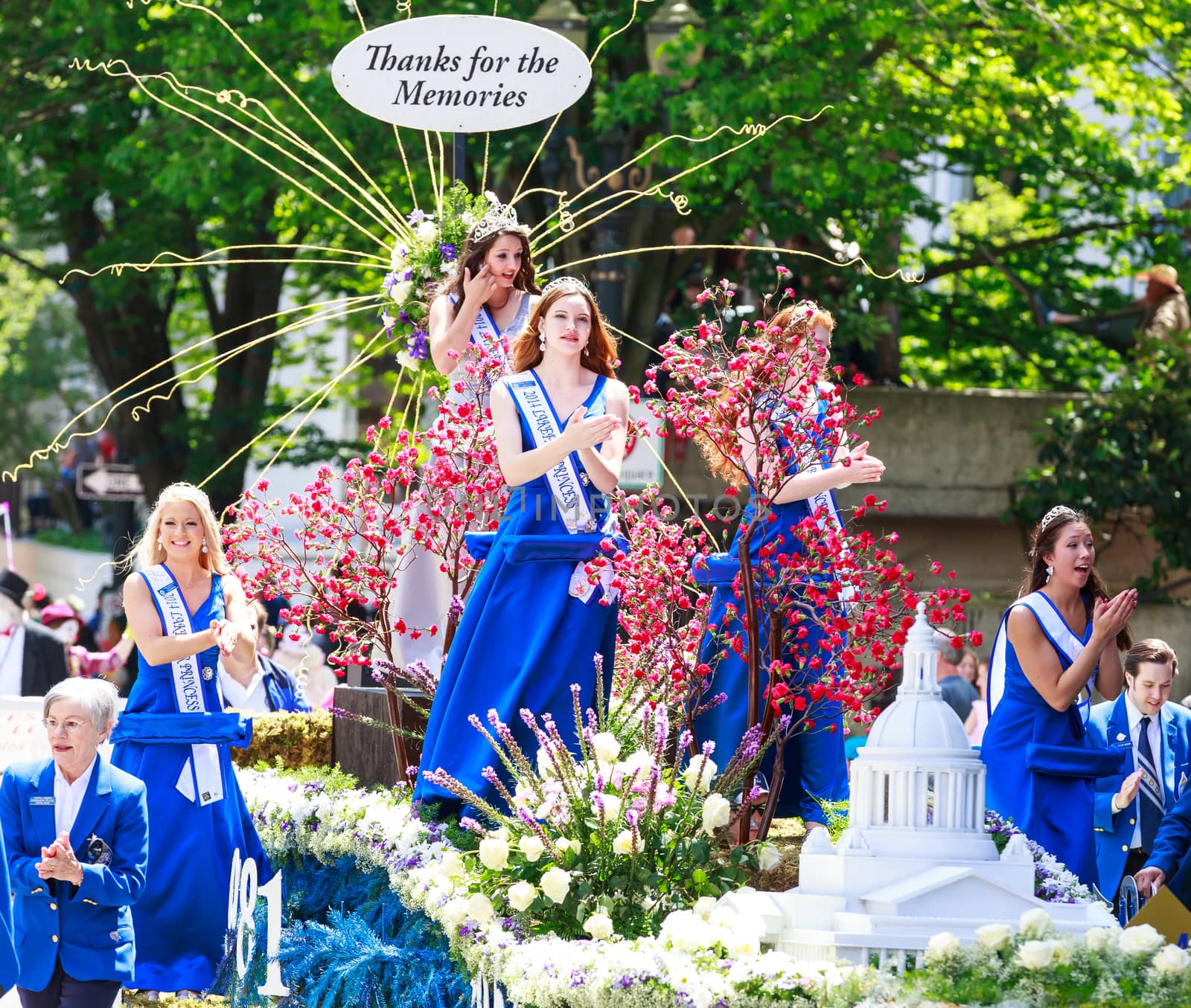 Portland, Oregon, USA - JUNE 7, 2014: Olympia Capital Lakefair Float in Grand floral parade through Portland downtown.