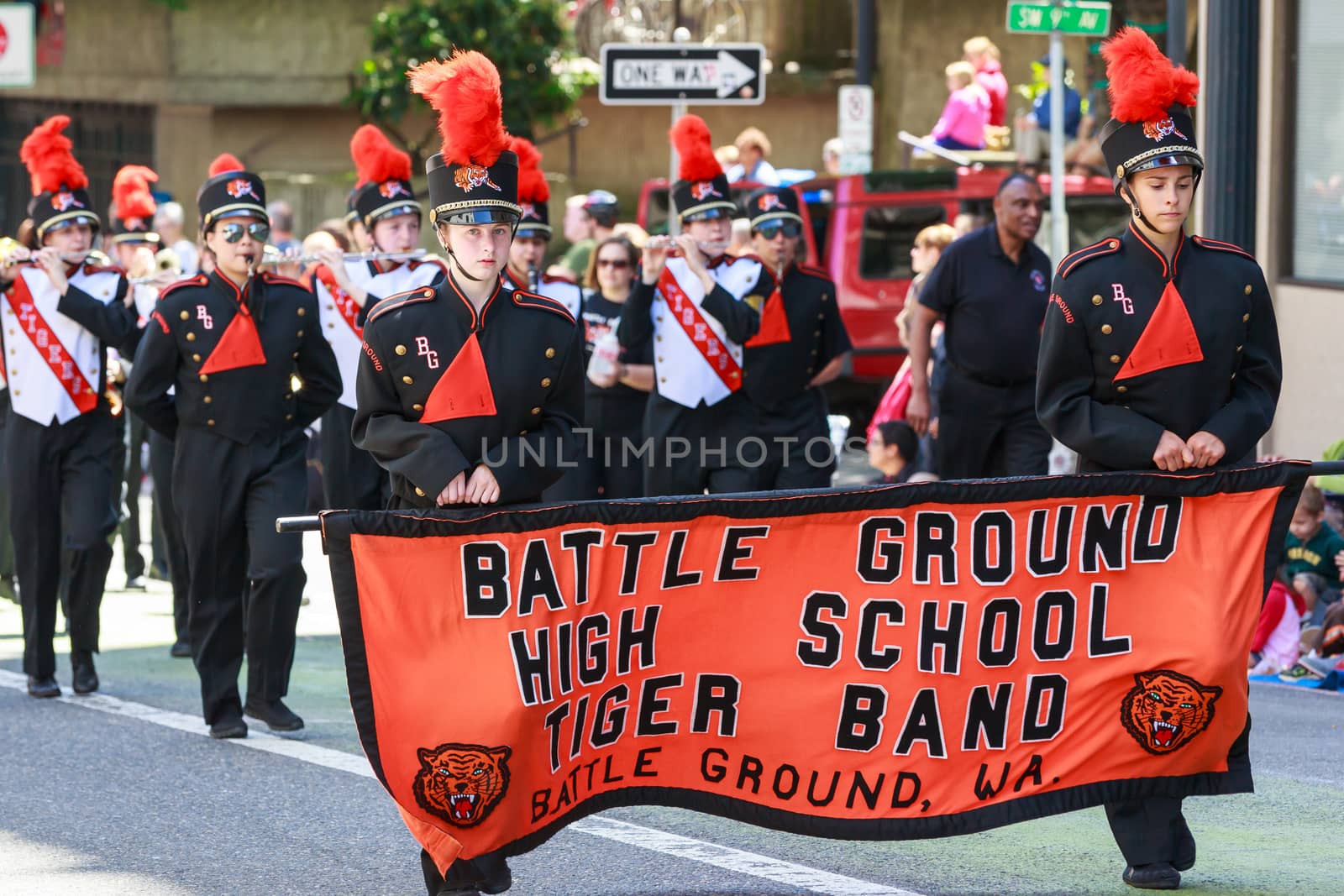 Portland, Oregon, USA - JUNE 7, 2014: Battle Ground High School Marching Band in Grand floral parade through Portland downtown.