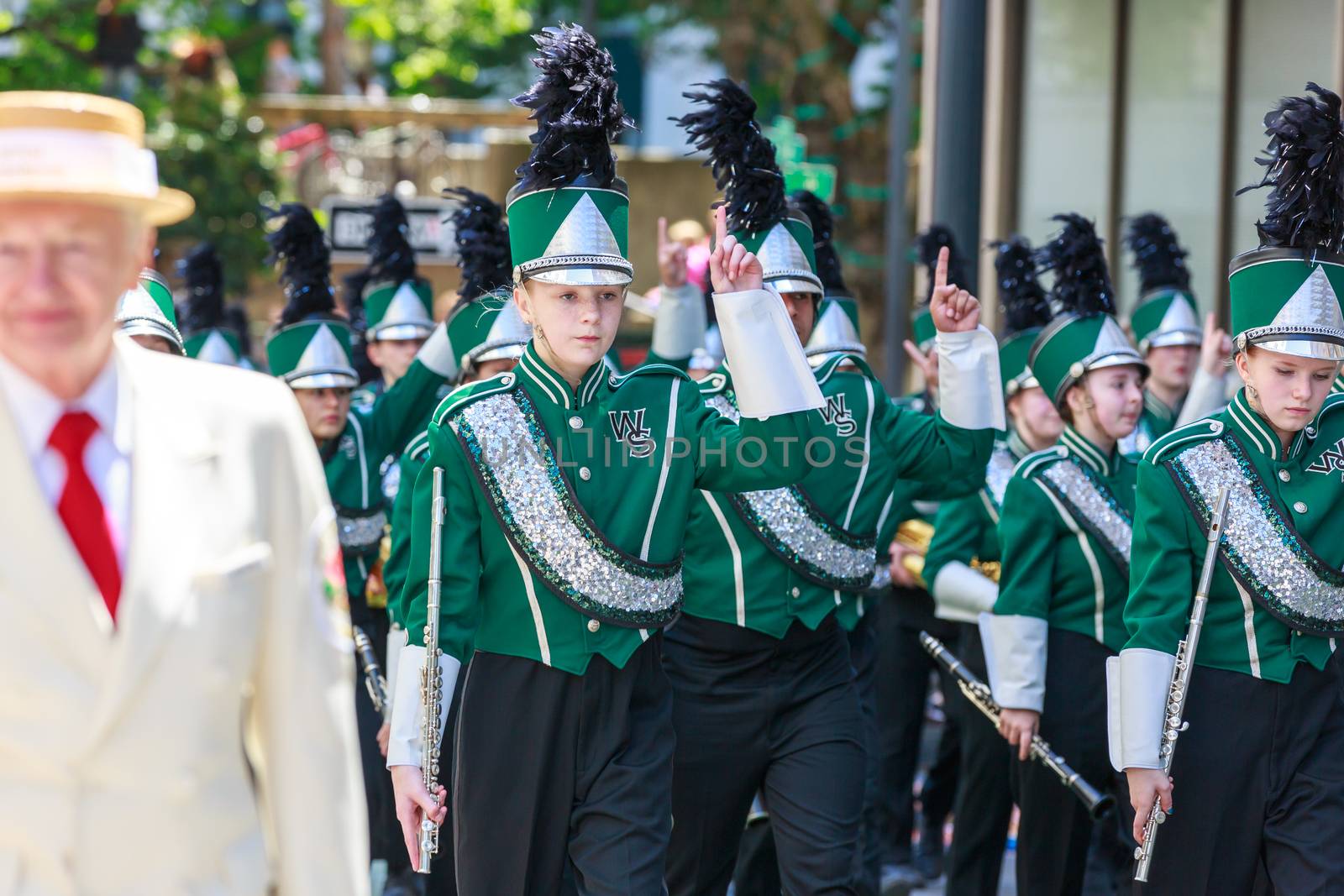 Portland, Oregon, USA - JUNE 7, 2014: West Salem High School Marching Band in Grand floral parade through Portland downtown.